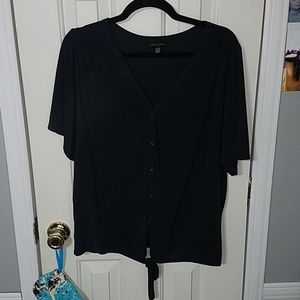 black button up shirt with a tie at the bottom